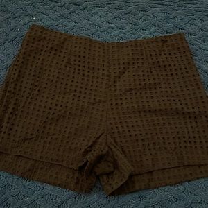 Pattern black shorts. Gently worn. Size 16.